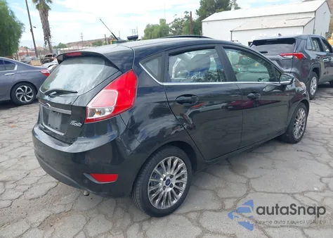 2014 Ford Fiesta Titanium из США, поврежденный, VIN 3FADP4FJ4EM206114